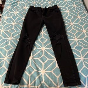 Next level stretch jagging‘s black size 6 holes on the knees